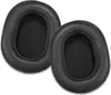 Two black ear pads for headphones are shown from a top-down diagonal angle against a white background. Podgląd zdjęcia produktu