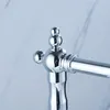 A close-up shot of a chrome faucet handle with decorative elements. Náhled obrázku produktu