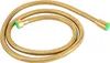 A coiled golden shower hose with green caps on both ends, presented against a white background. Podgląd zdjęcia produktu