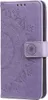 A close-up view of a purple flip phone case with a mandala design. Produktbild-Vorschau