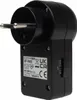 A black plug-in motion sensor with a UK plug. Náhled obrázku produktu