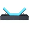 A black rattan sun lounger with a blue cushion, shown from the front with the backrests raised. Náhľad obrázku produktu
