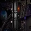 A close-up view of computer RAM modules installed on a motherboard. Náhled obrázku produktu