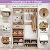 A multi-functional entryway organizer with shelves, hooks, and a bench, presented with feature callouts. Voir les images du produit