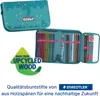 A teal pencil case with a confetti pattern, shown open to display colored pencils, a ruler, and other stationery. A green arrow overlay highlights "MADE FROM UPCYCLED WOOD". Náhled obrázku produktu