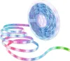 A roll of LED light strips with a portion unrolled and illuminated with a gradient of colors. Anteprima dell’immagine prodotto