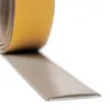 A close-up, angled view of a roll of beige adhesive tape, with the tape unrolling onto a white surface. Produktbild-Vorschau