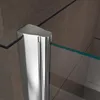 A close-up view of a shower door hinge and glass edge against a tiled wall. Produktbild-Vorschau