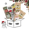 A Christmas-themed gift box filled with pet food products, including cans and bags, with an advent calendar and a cartoon cow illustration. Produktbild-Vorschau