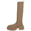 A single khaki-colored boot is shown against a white background. Produktbild-Vorschau