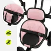 Close-up view of the padded seat and backrest of a pink child's tricycle, with safety icons visible on the left. Produktbild-Vorschau