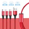 A set of red charging cables with different connectors, displayed against a white and red background. Anteprima dell’immagine prodotto