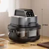 A multi-functional air fryer is shown on a wooden countertop, with dimensions indicated. Produktbild-Vorschau