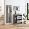 A hallway with a coat rack, mirror, and shoe cabinet. Anteprima dell’immagine prodotto