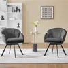 Two gray swivel chairs are placed in a room with a bookshelf and a small side table. Produktbild-Vorschau