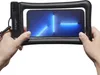 Hands holding a smartphone inside a waterproof pouch. Podgląd zdjęcia produktu