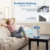 A woman relaxing on a couch while a portable air cooler operates on a table. Produktbild-Vorschau