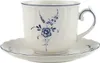 A white ceramic teacup and saucer with a blue floral pattern. Anteprima dell’immagine prodotto
