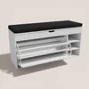A white shoe cabinet with a black seat on top, shown from a three-quarter angle against a light gray background. Produktbild-Vorschau