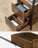 Close-up view of drawers in a wooden storage unit. Náhled obrázku produktu