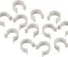 A collection of white plastic clips arranged on a white background. Produktbild-Vorschau