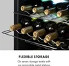 A close-up of a wine cooler with bottles stored on shelves. Náhľad obrázku produktu
