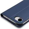 A close-up view of a blue flip case for a smartphone, showing the camera cutout. Anteprima dell’immagine prodotto