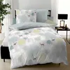 A duvet cover and pillow set with a forest and deer pattern is displayed on a bed. Produktbild-Vorschau