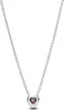 A silver necklace with a pink heart-shaped pendant. Podgląd zdjęcia produktu