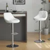 Two white bar stools are shown in a modern interior setting, likely a kitchen or dining area. Náhľad obrázku produktu