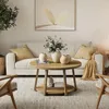 A living room scene with a coffee table, sofa, and chairs. Produktbild-Vorschau