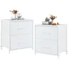 Two white two-drawer nightstands are shown against a white background, each with decorative items on top. Produktbild-Vorschau