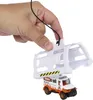 A hand holding a toy vehicle with a white cage-like accessory. Anteprima dell’immagine prodotto
