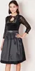 A woman is modeling a black dirndl dress. Produktbild-Vorschau