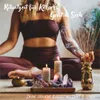 A woman meditating with incense and candles. Produktbild-Vorschau