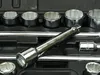 A close-up view of a socket wrench set in its case. Anteprima dell’immagine prodotto