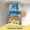 A young boy is sleeping in a bed with Spongebob themed bedding. Produktbild-Vorschau