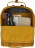 The inside of a yellow backpack is shown, containing a water bottle and notebooks. Anteprima dell’immagine prodotto