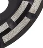 A close-up view of a diamond grinding cup wheel with segmented abrasive surfaces. Produktbild-Vorschau