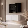 A modern living room with a wall-mounted TV and media console. Náhled obrázku produktu