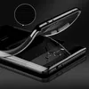 A clear phone case is shown on a black background, highlighting its texture and transparency. Produktbild-Vorschau