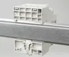 A close-up shot of electrical components mounted on a metal rail. Produktbild-Vorschau