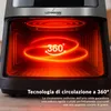 Close-up of the inside of an air fryer with heating elements glowing red, illustrating 360-degree circulation. Anteprima dell’immagine prodotto