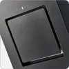 A close-up view of the top surface of a black range hood. Produktbild-Vorschau