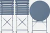 A set of folding bistro chairs and a table. Produktbild-Vorschau