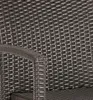 A close-up view of the woven texture of a chair arm and seat. Produktbild-Vorschau