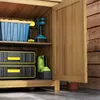 Interior view of a wooden storage cabinet filled with tools and toolboxes. Produktbild-Vorschau