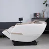 A massage chair is shown in a room with a sofa and a cabinet in the background. Produktbild-Vorschau