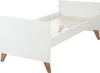 A white baby bed with wooden legs on a white background. Produktbild-Vorschau