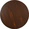 A top-down view of a round wooden table. Náhled obrázku produktu